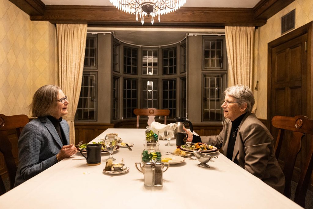 two women eating dinner together